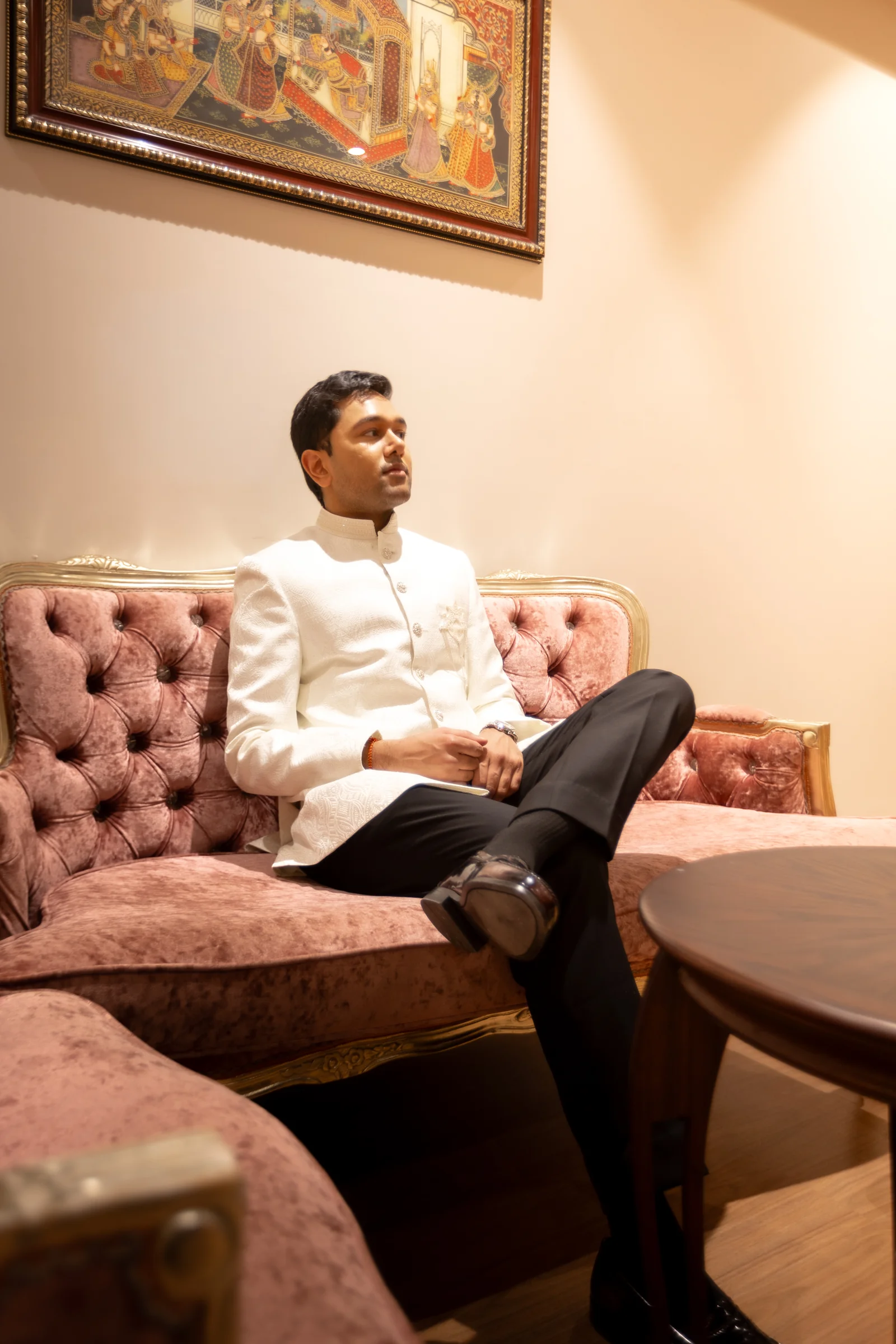 Jay seated in a quiet portrait before the wedding ceremony