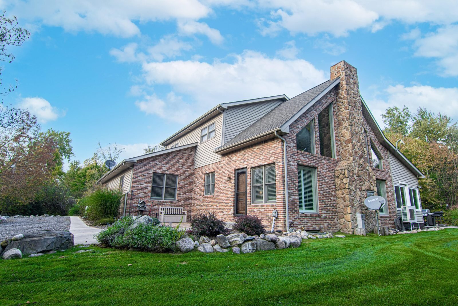 Large brick and stone home photographed in Michigan