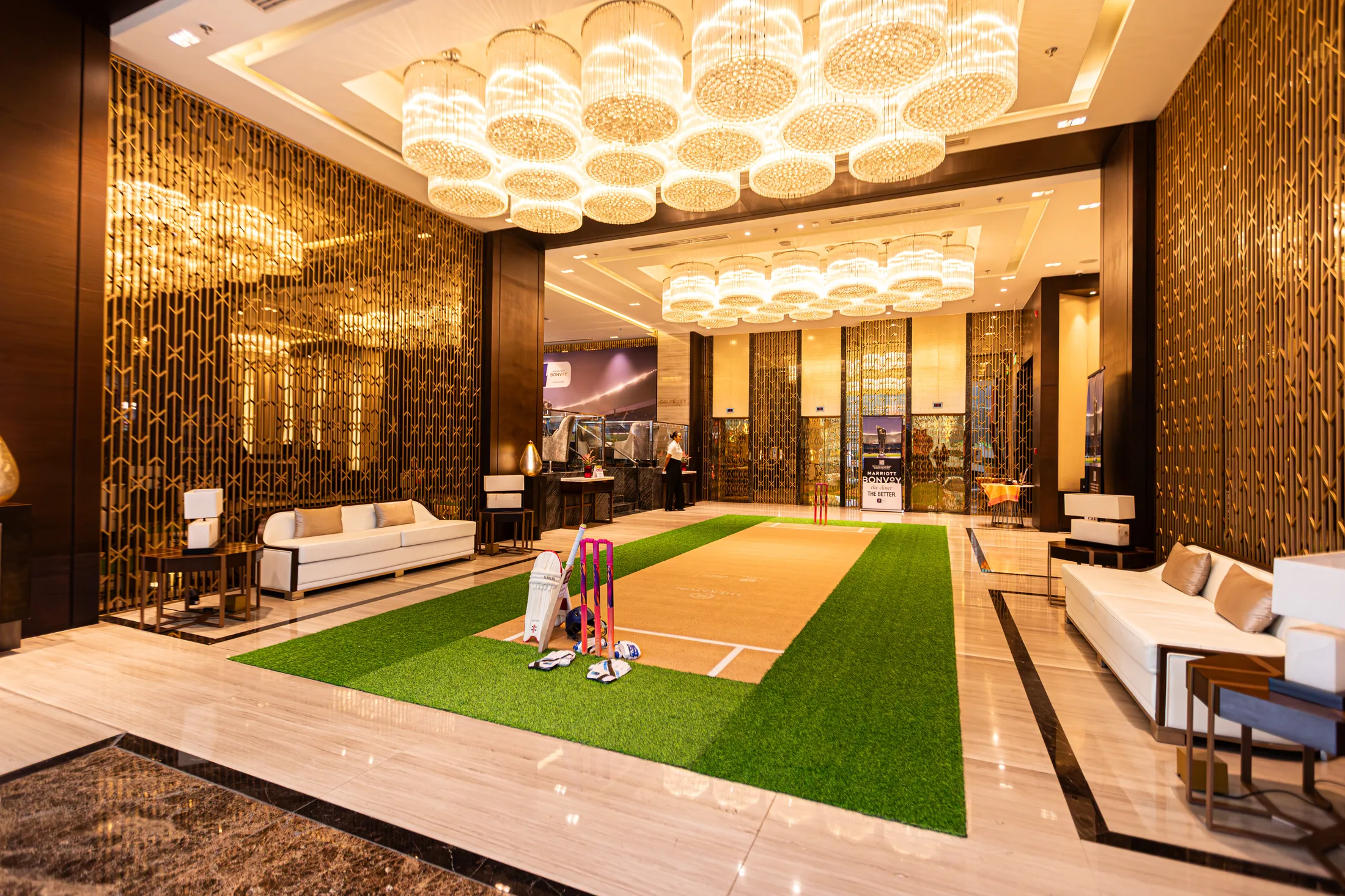Sheraton Colombo Hotel lobby staged with a cricket pitch installation